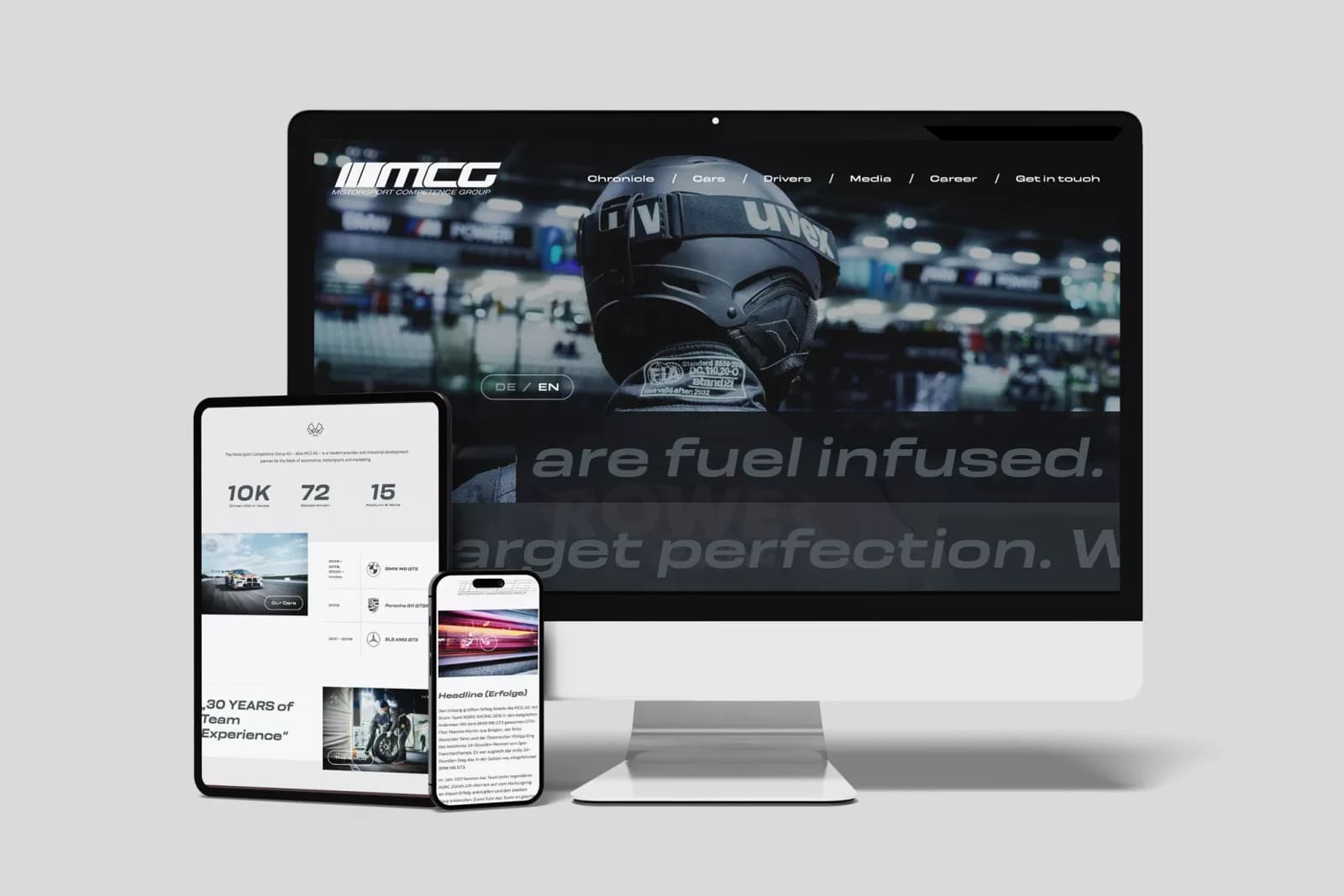 Website der Motorsport Competence Group auf Laptop und Smartphone